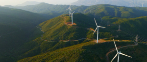 Wind turbines across grassy hills